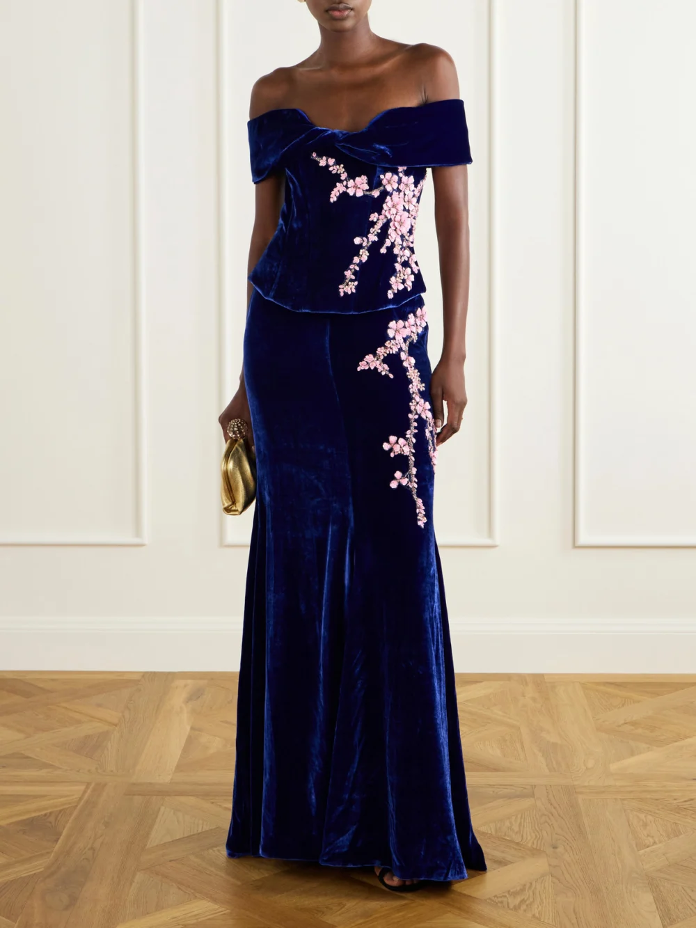 Costarellos Rielle Flower-appliqué Off-shoulder Velvet Gown, worn by a model