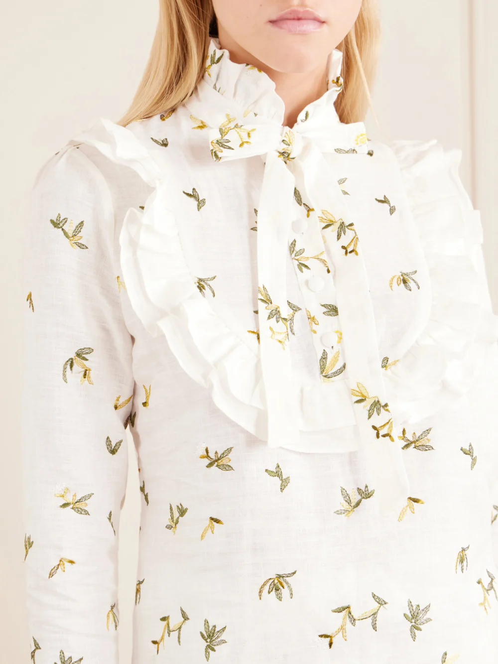 Close-up detail of the Cristiano Marcheli Valeria Ruffled Embroidered Linen Blouse
