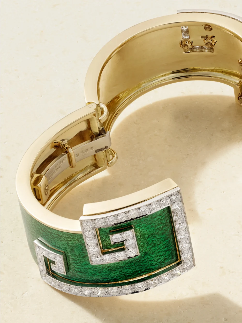 Back view of the David Webb Scroll 18-karat Gold and Platinum, Diamond and Enamel Bangle