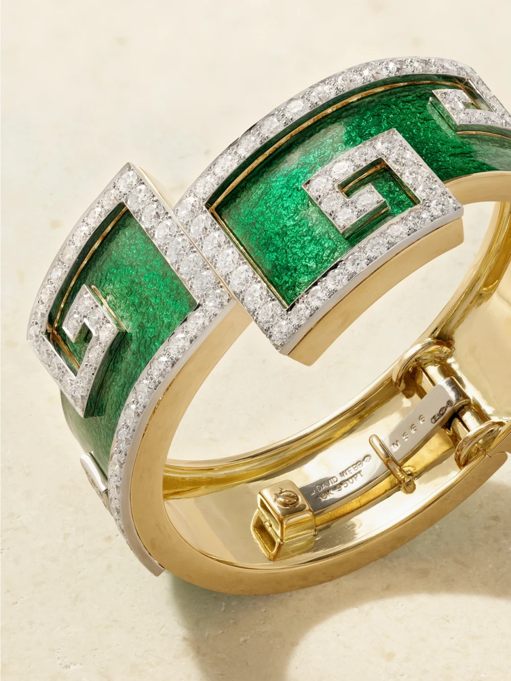 Close-up detail of the David Webb Scroll 18-karat Gold and Platinum, Diamond and Enamel Bangle