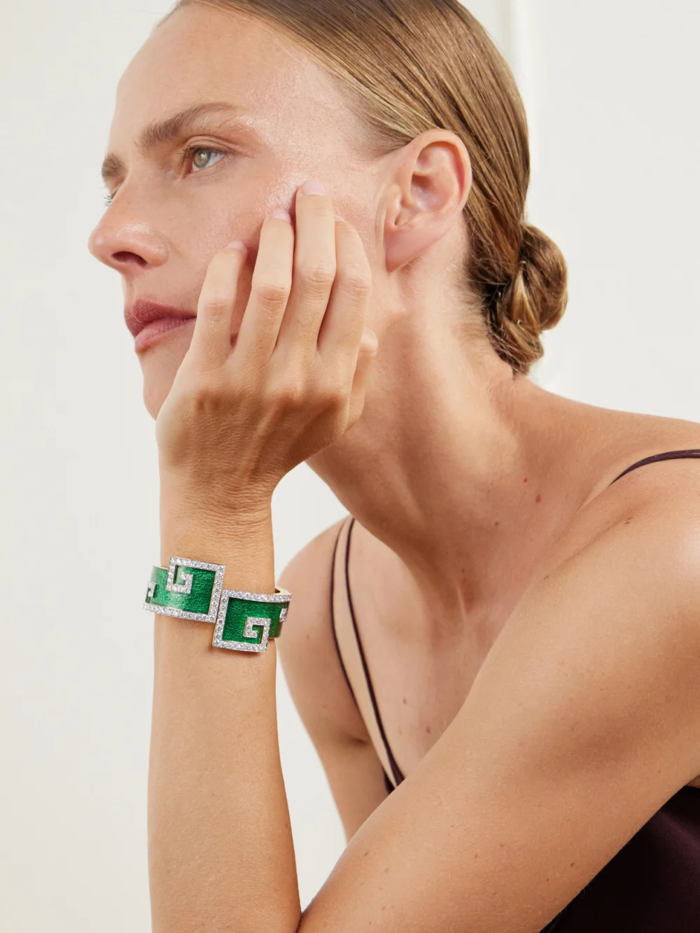 David Webb Scroll 18-karat Gold and Platinum, Diamond and Enamel Bangle, styled view