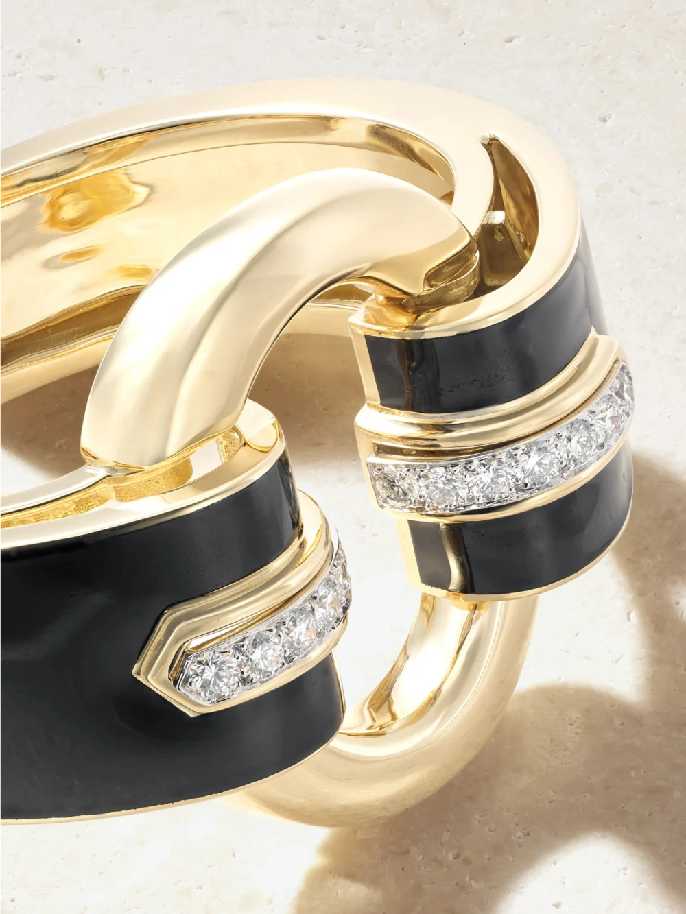 Close-up detail of the David Webb Strap 18-karat Gold, Platinum, Diamond and Enamel Cuff