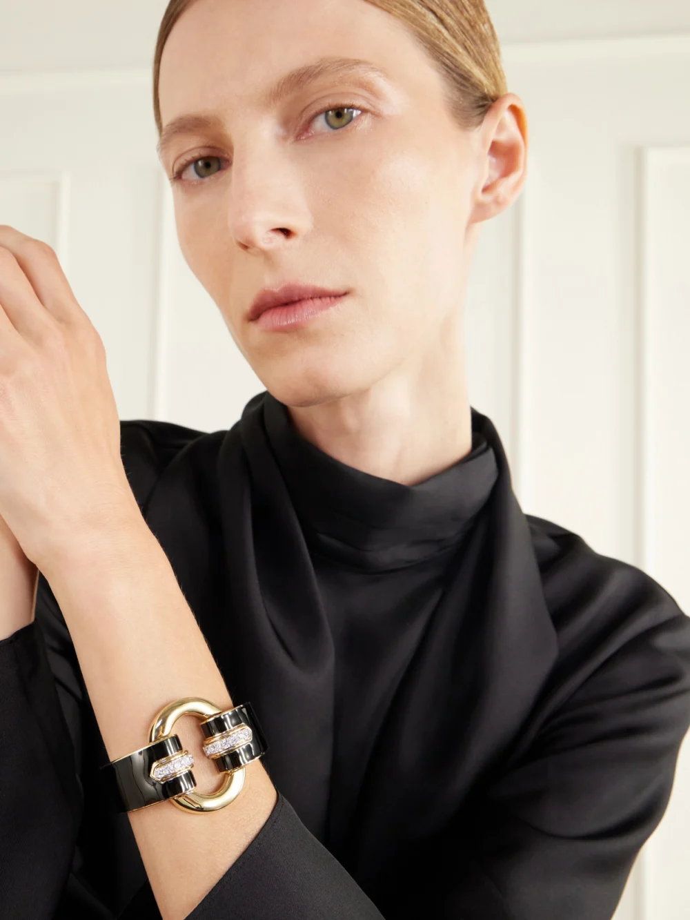 David Webb Strap 18-karat Gold, Platinum, Diamond and Enamel Cuff, styled view