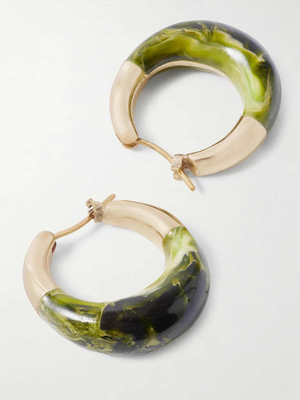 Close-up detail of the Dinosaur Designs Small Gold-tone and Resin Hoop Earrings