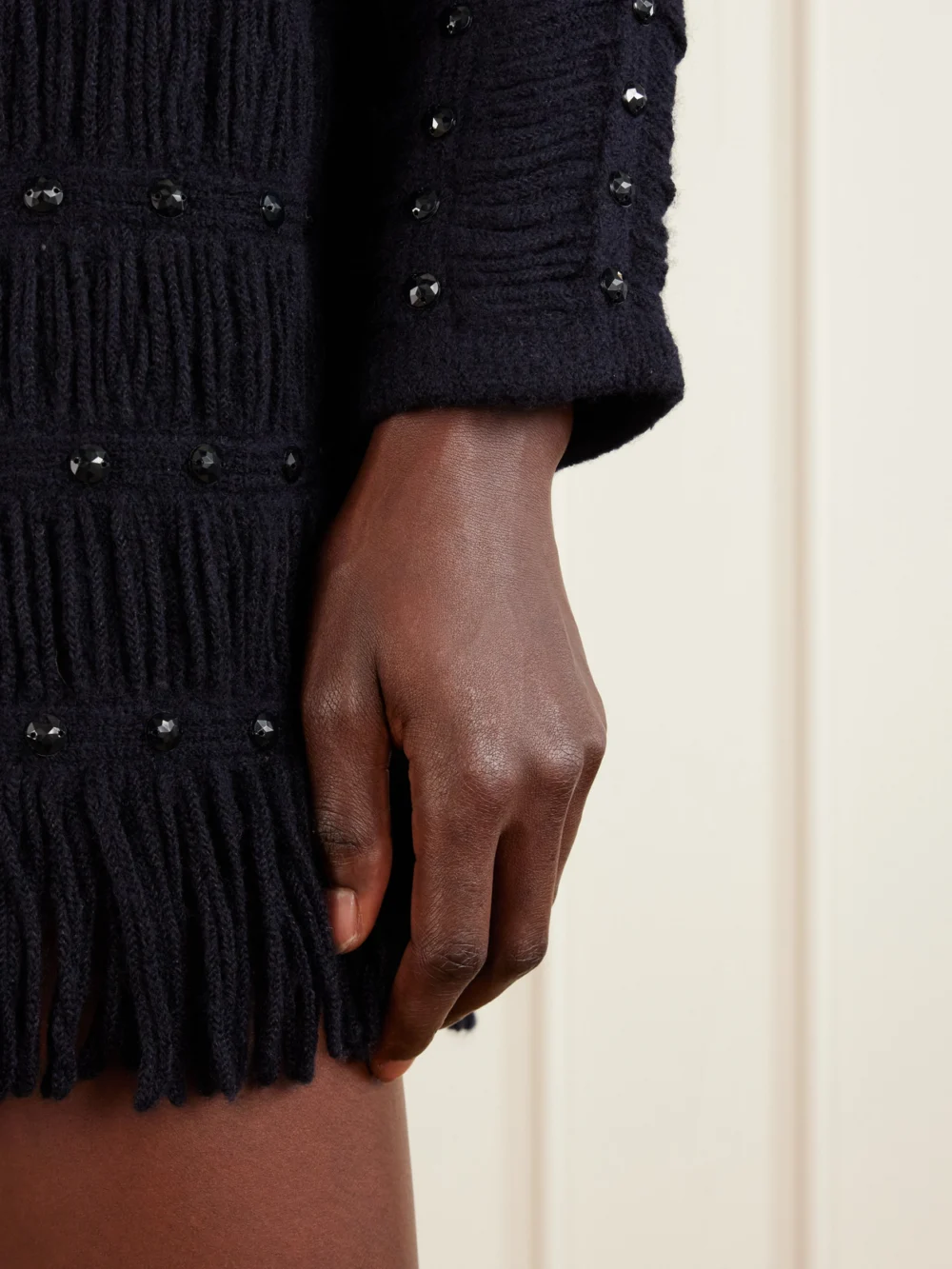 Close-up detail of the Diotima Notte Fringed Embellished Open-knit Merino Wool-blend Mini Dress