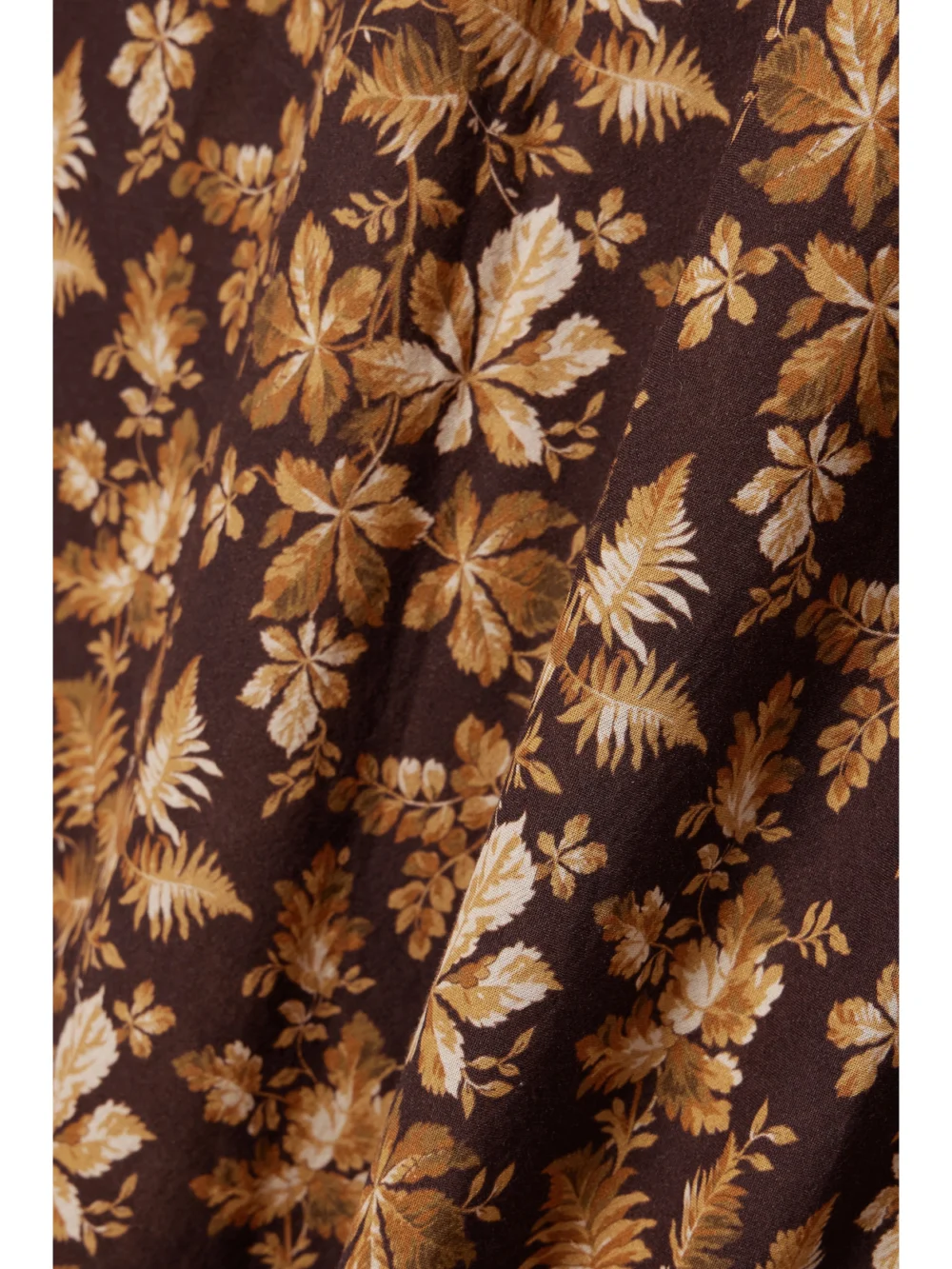 Close-up detail of the Dôen Amande Printed Cotton-voile Maxi Dress