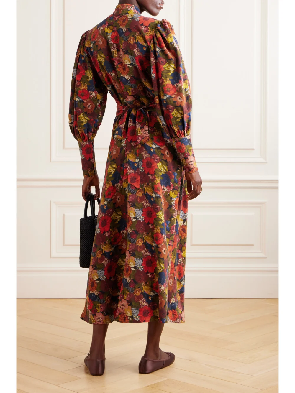 Back view of the Dôen Blossom Pussy-bow Floral-print Silk-crepe Maxi Dress