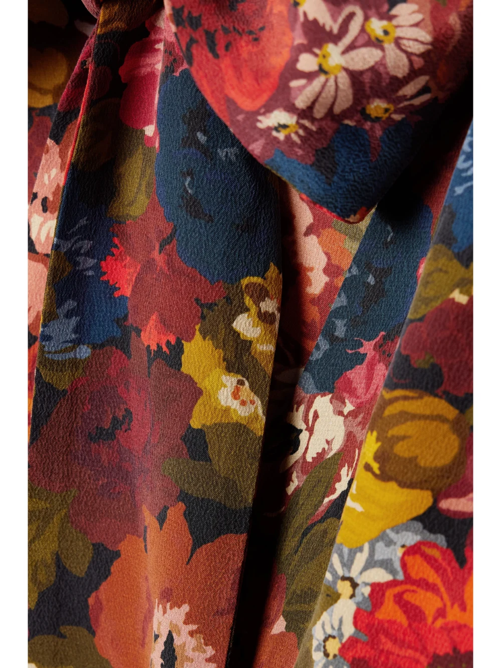 Close-up detail of the Dôen Blossom Pussy-bow Floral-print Silk-crepe Maxi Dress