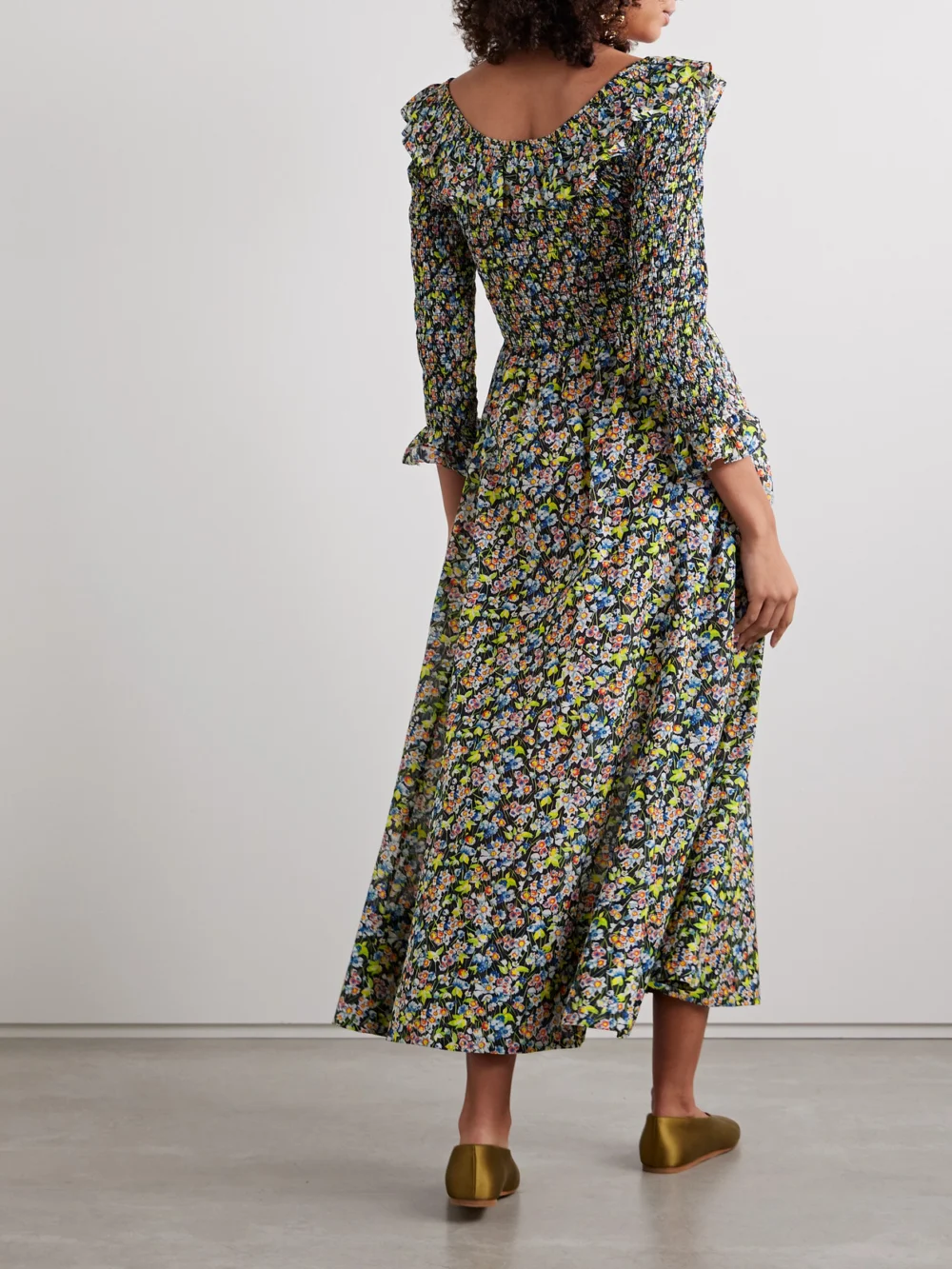 Back view of the Dôen Rosenda Ruffled Shirred Floral-print Organic Cotton-blend Voile Midi Dress