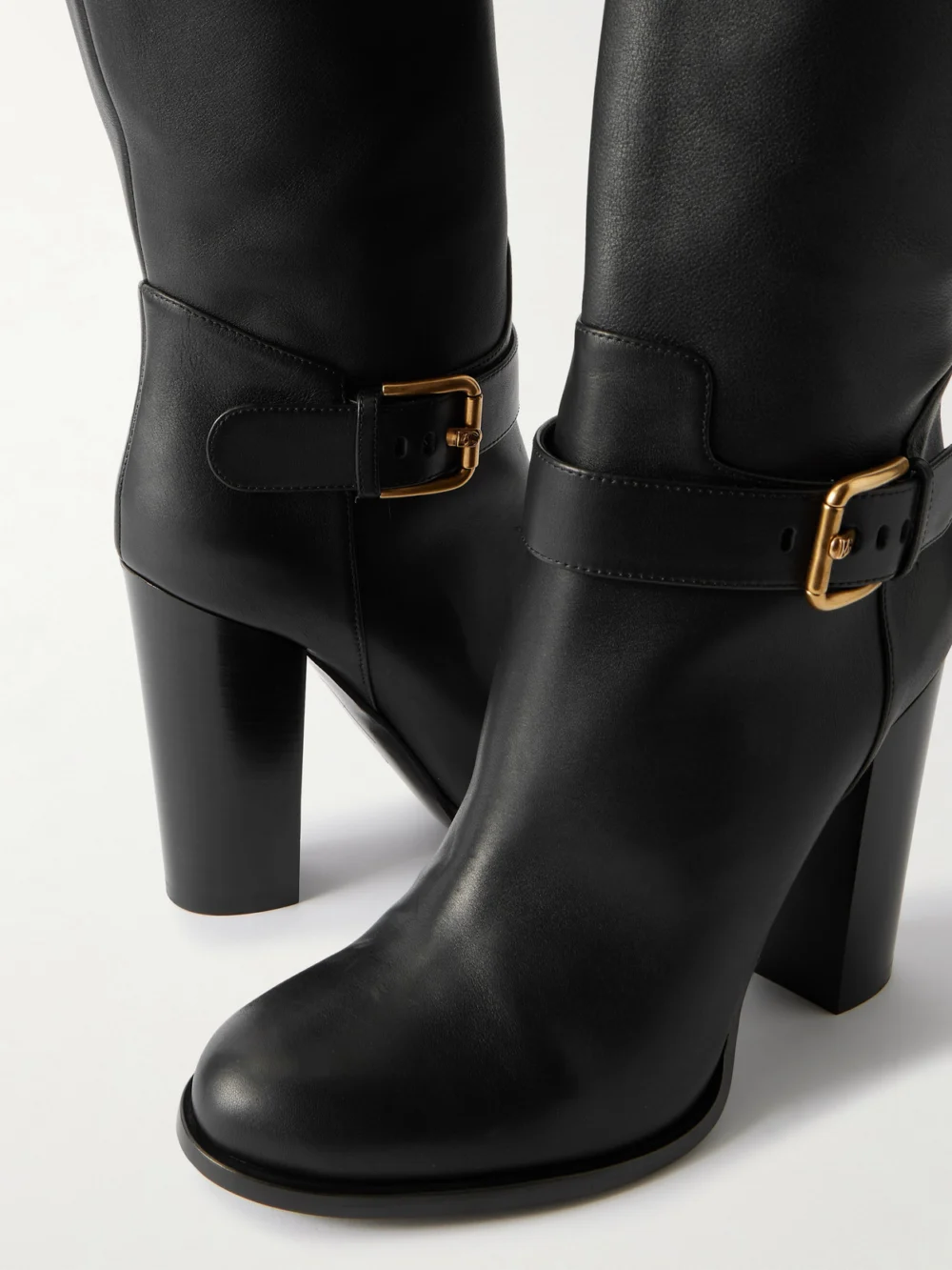 Close-up detail of the Dolce & Gabbana Buckled Leather Knee Boots