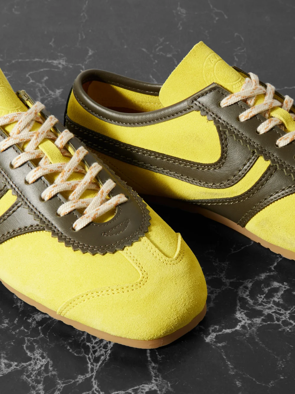 Close-up detail of the Dries Van Noten Leather-trimmed Suede Sneakers