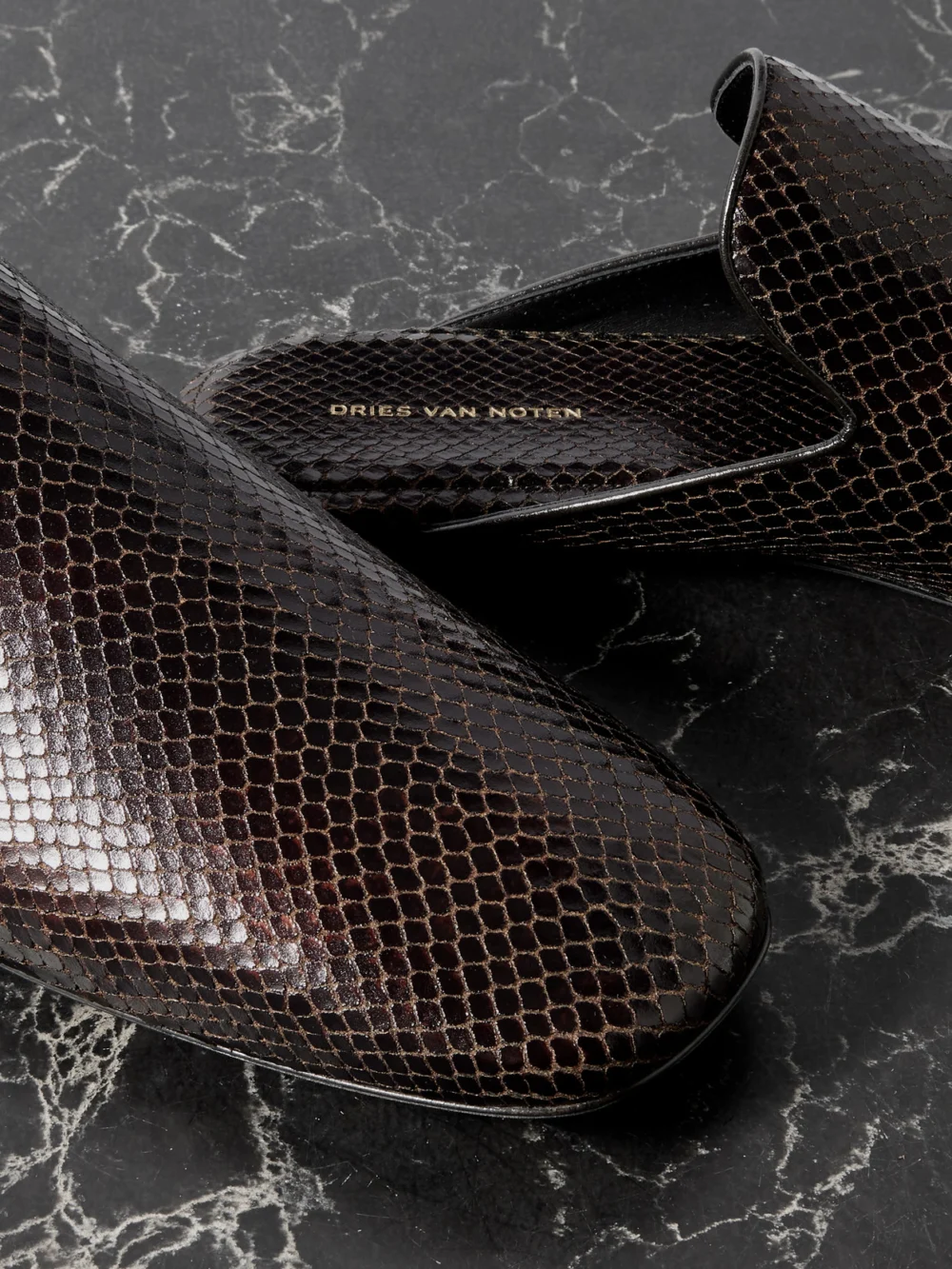 Close-up detail of the Dries Van Noten Snake-effect Leather Mules