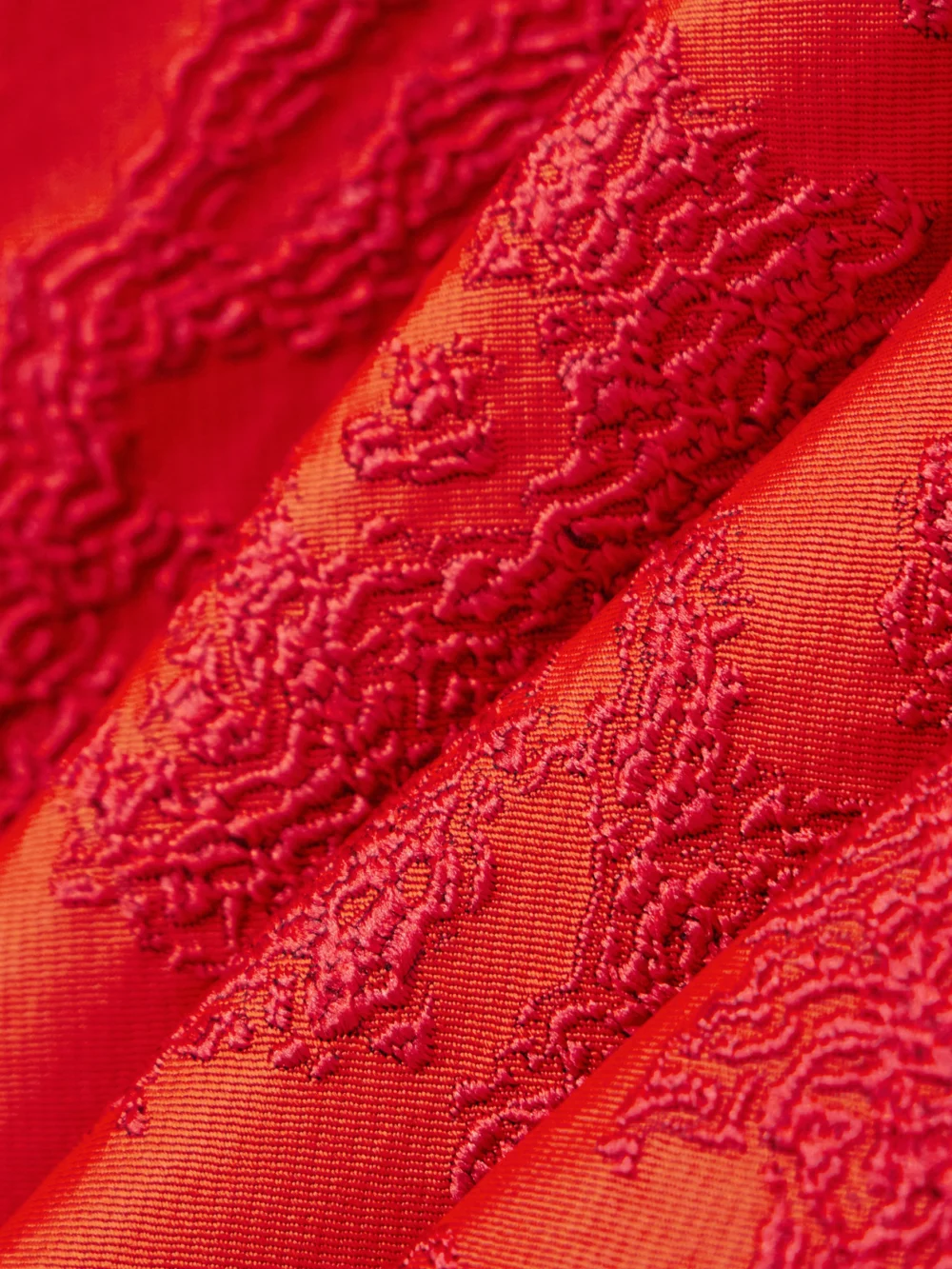 Close-up detail of the Emilia Wickstead Zarit Off-the-shoulder Bouclé-jacquard Maxi Dress