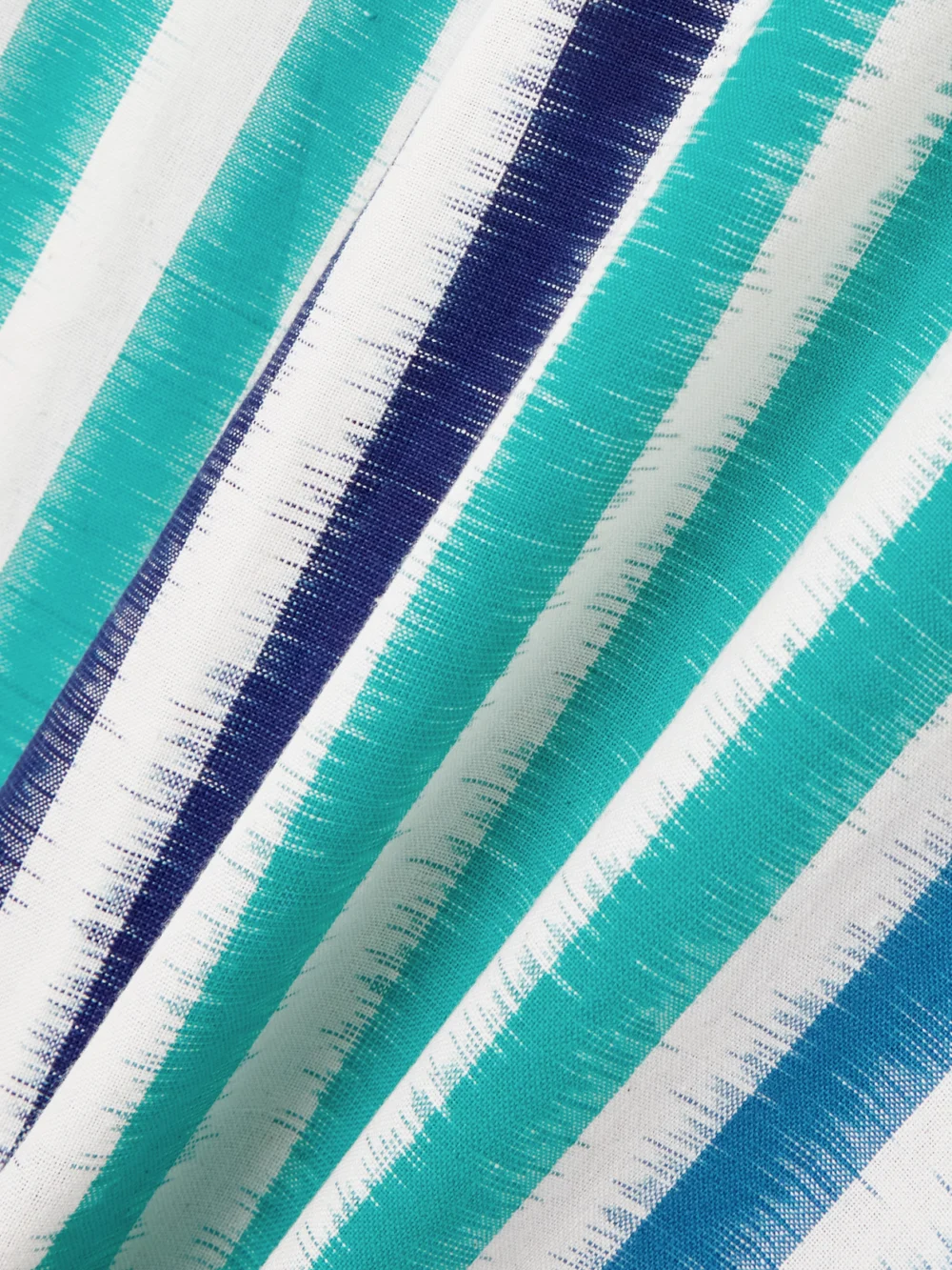 Close-up detail of the Emporio Sirenuse Nellie Striped Cotton Maxi Dress