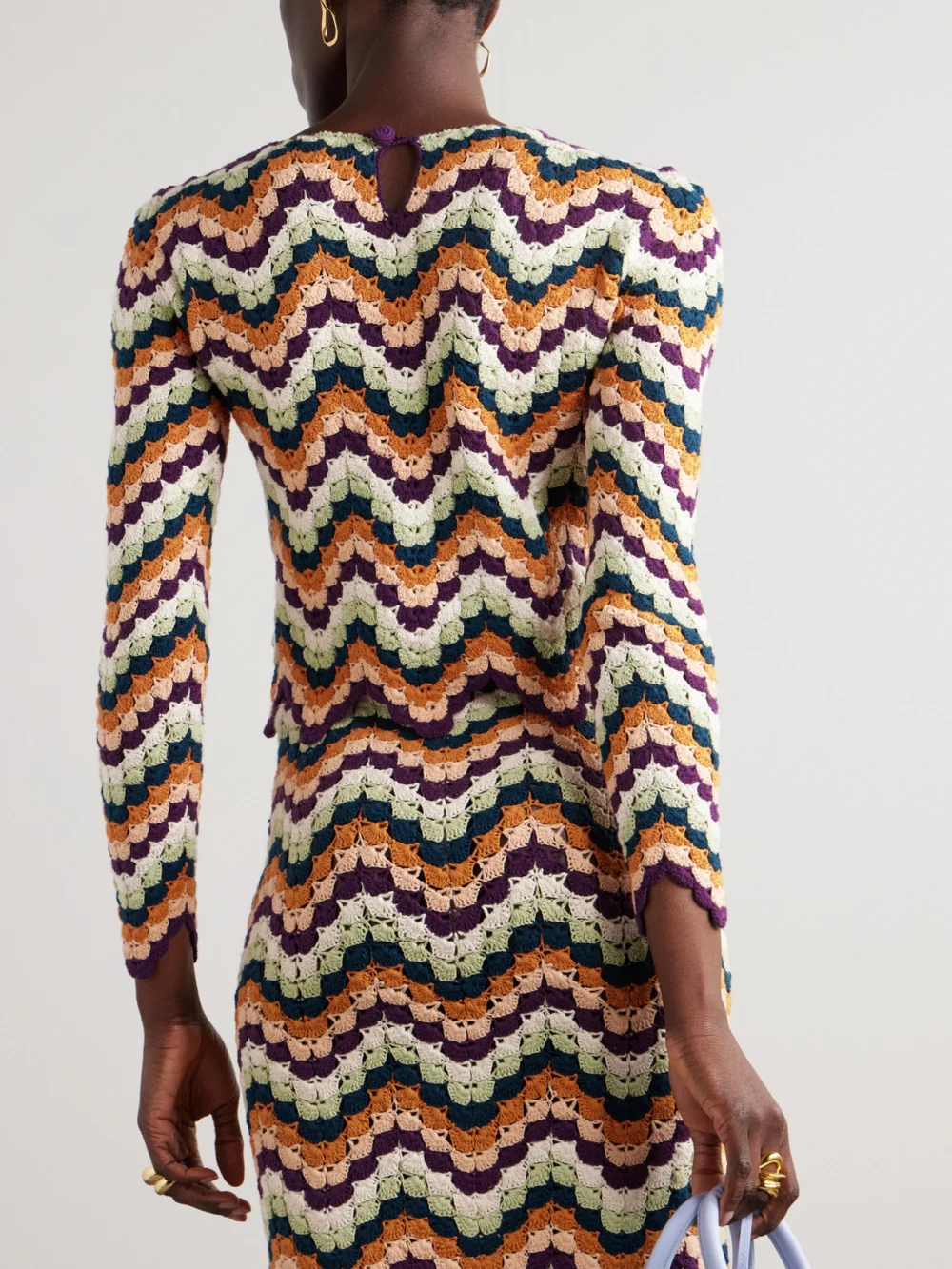 Back view of the Escvdo Safi Pesca Scalloped Striped Crocheted Organic Cotton Top