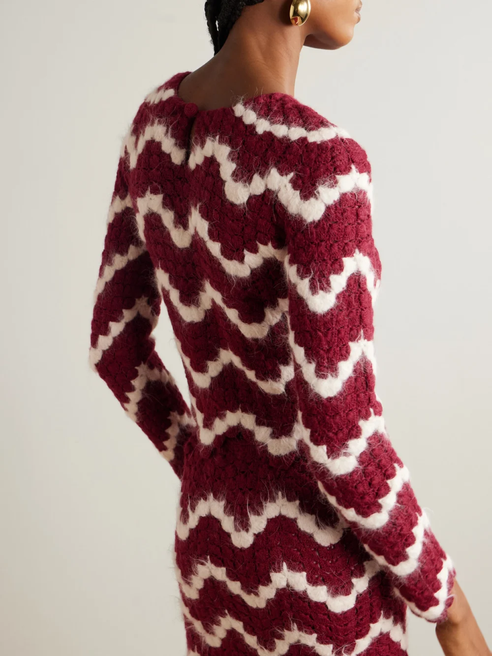 Back view of the Escvdo Safi Scalloped Cropped Crocheted Alpaca Top