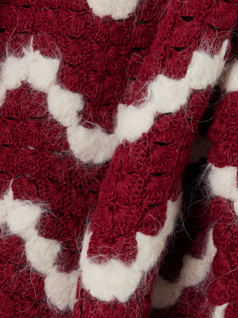 Close-up detail of the Escvdo Safi Scalloped Cropped Crocheted Alpaca Top
