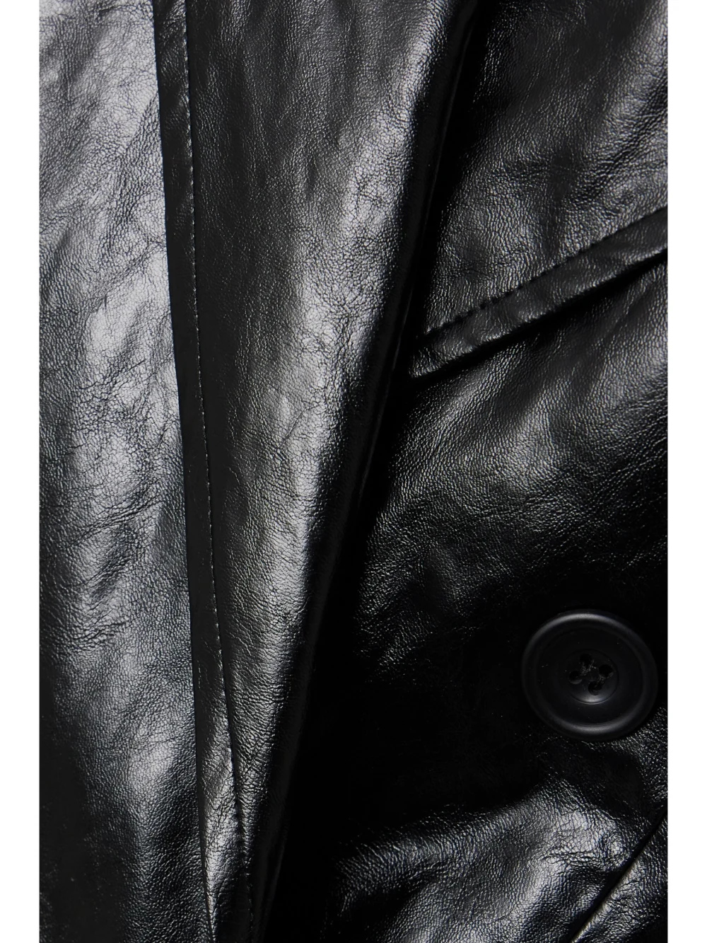Close-up detail of the Esse Studios Milos Double-breasted Crinkled Faux Leather Blazer
