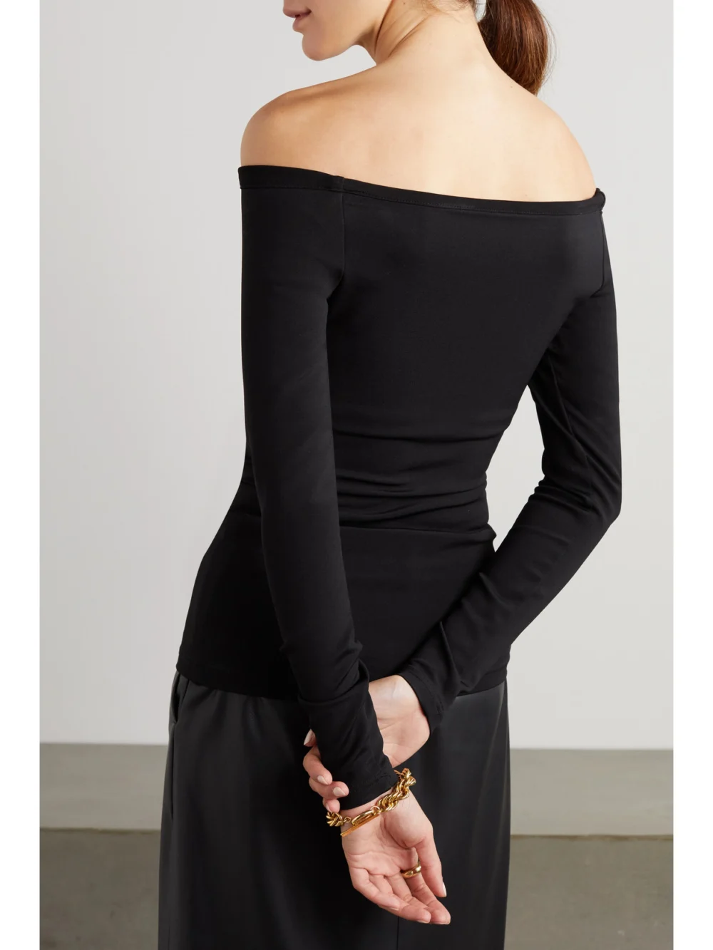 Back view of the Esse Studios Off-the-shoulder Stretch-knit Top