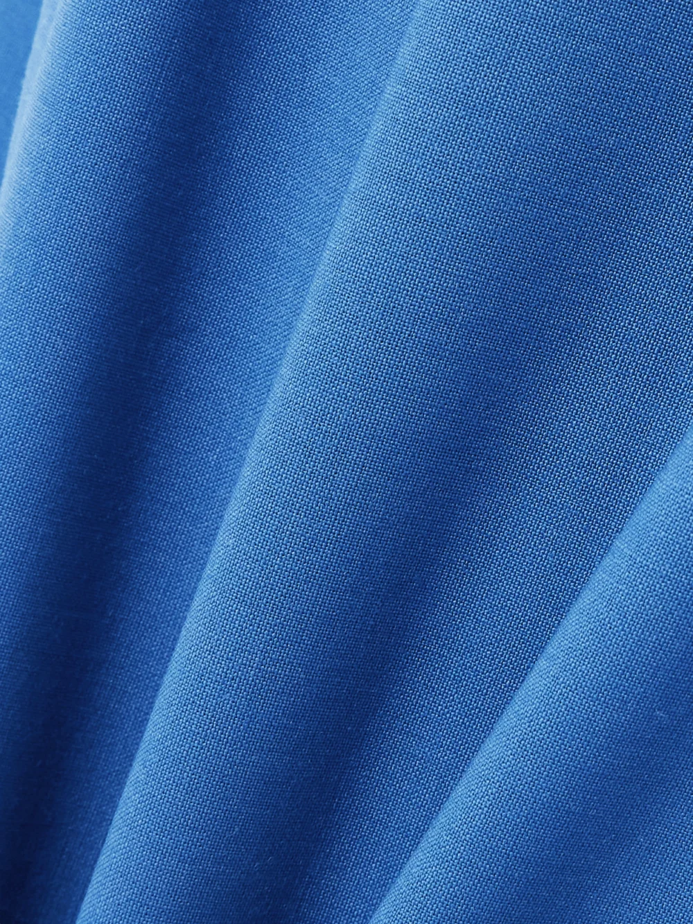 Close-up detail of the Esse Studios Pleated Woven Pants