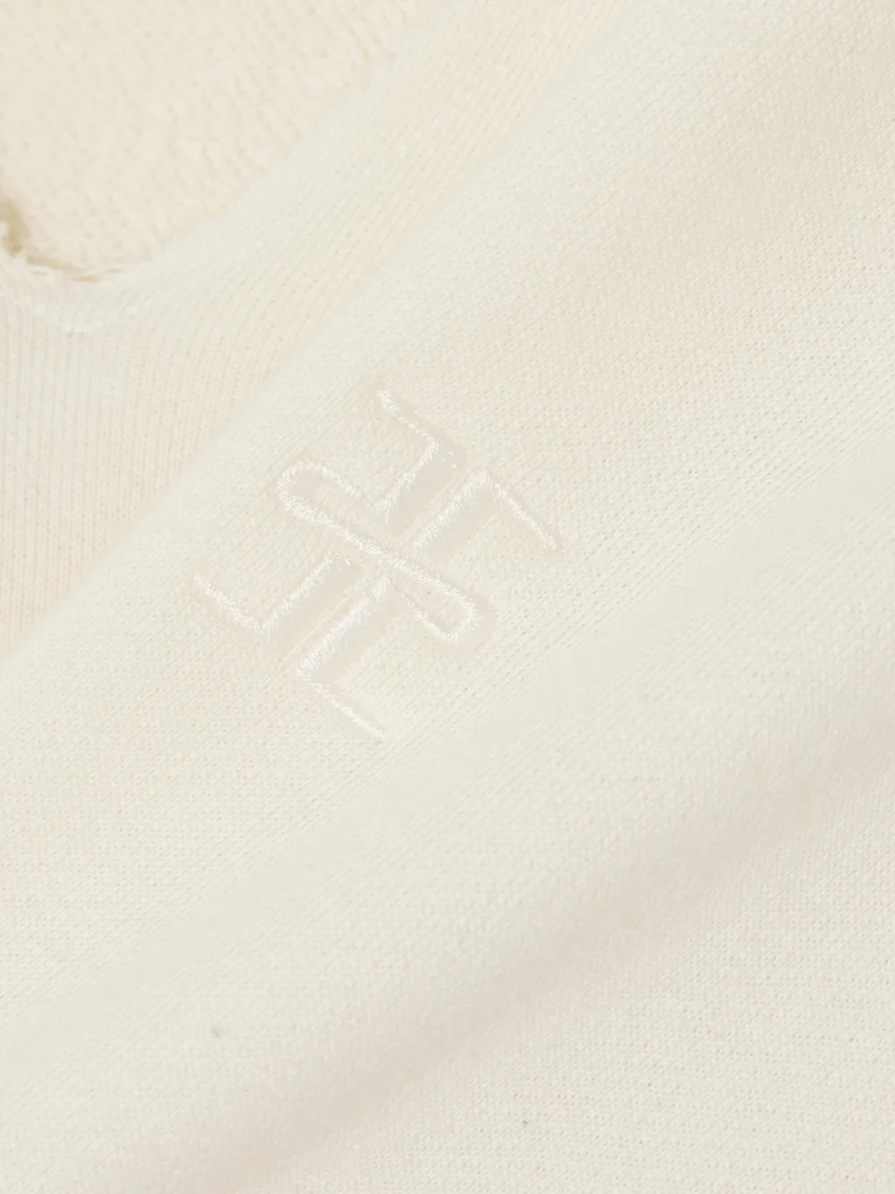Close-up detail of the Éterne Cropped Embroidered Cotton-blend Terry Sweater