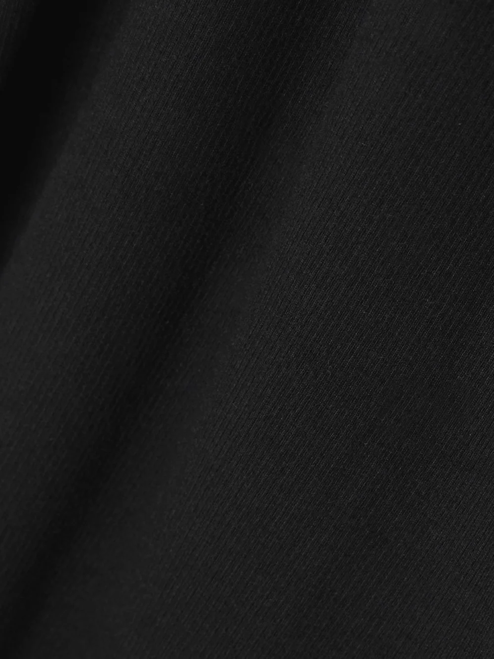 Close-up detail of the Éterne Ribbed Stretch-jersey Maxi Dress