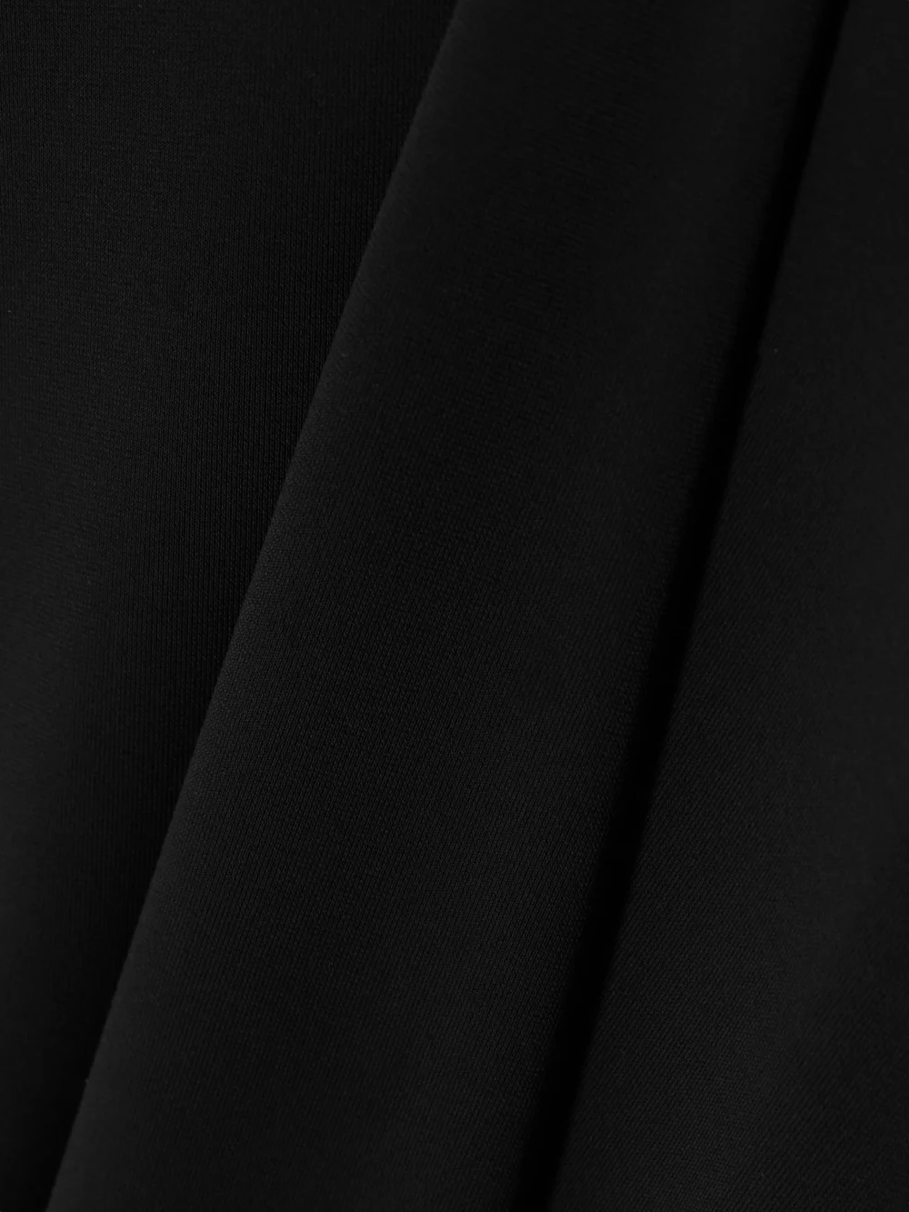 Close-up detail of the Éterne Valery Matte-jersey Halterneck Maxi Dress