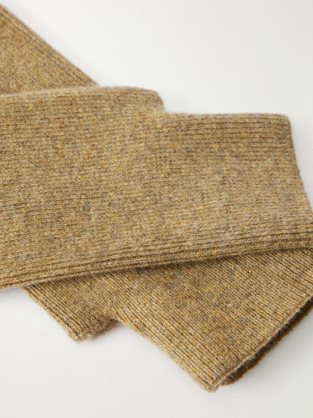 Close-up detail of the Extreme Cashmere Mouffle Knitted Cashmere-blend Fingerless Gloves