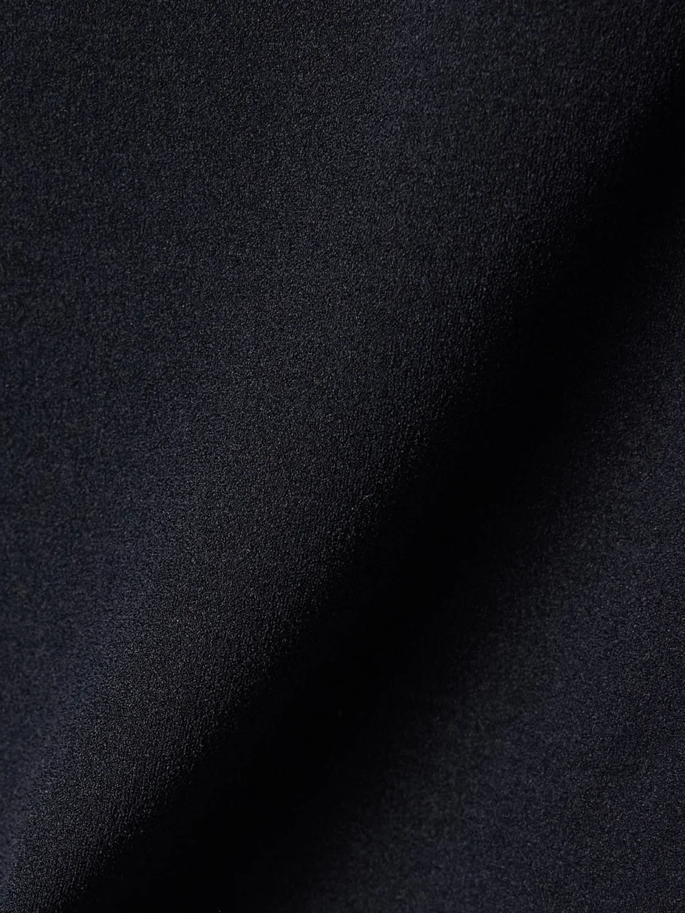 Close-up detail of the Fforme Ames Stretch-silk T-shirt