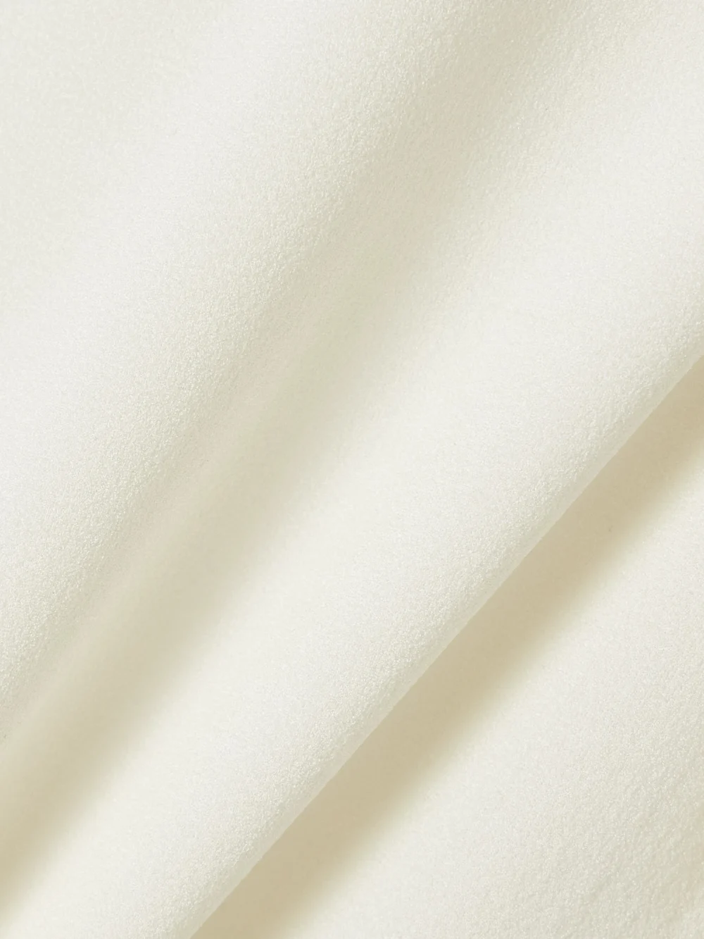 Close-up detail of the Fforme Ames Stretch-silk T-shirt