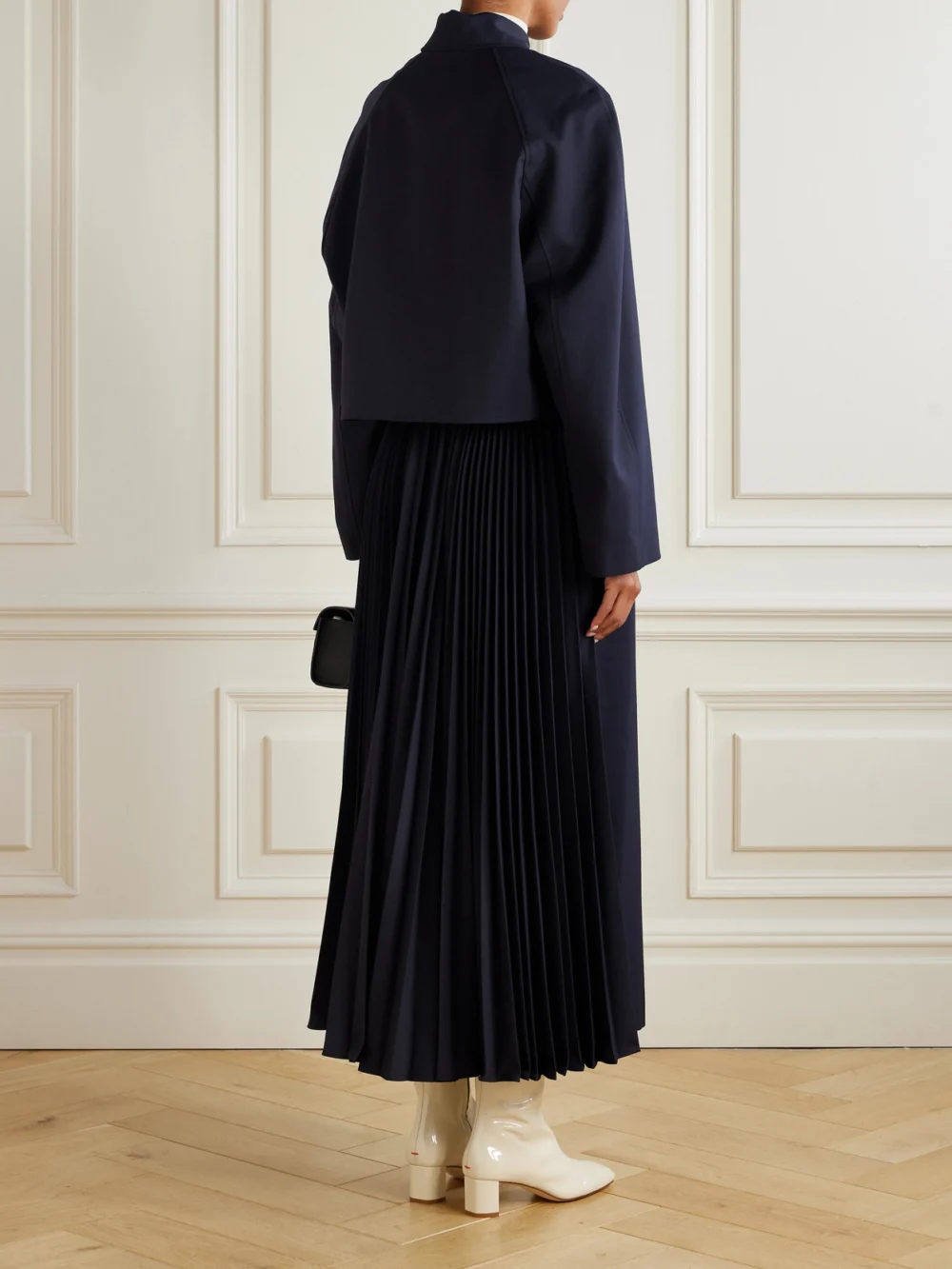 Back view of the Fforme Lennox Belted Pleated Twill Trench Coat