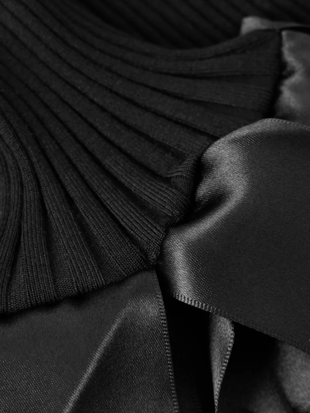 Close-up detail of the Fforme Nova Satin-trimmed Ribbed Wool-blend Top