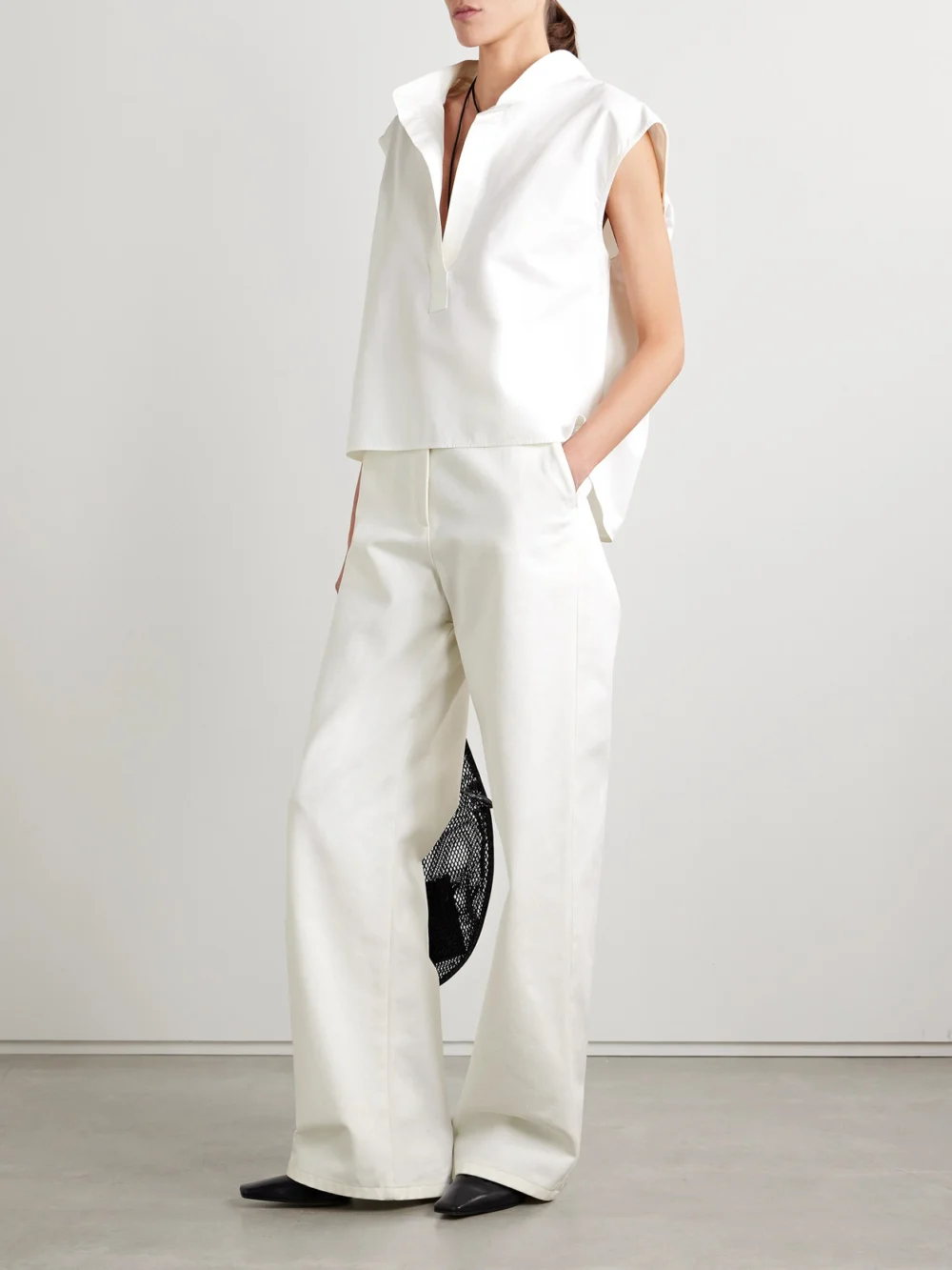 Fforme Strider High-rise Wide-leg Jeans, worn by a model