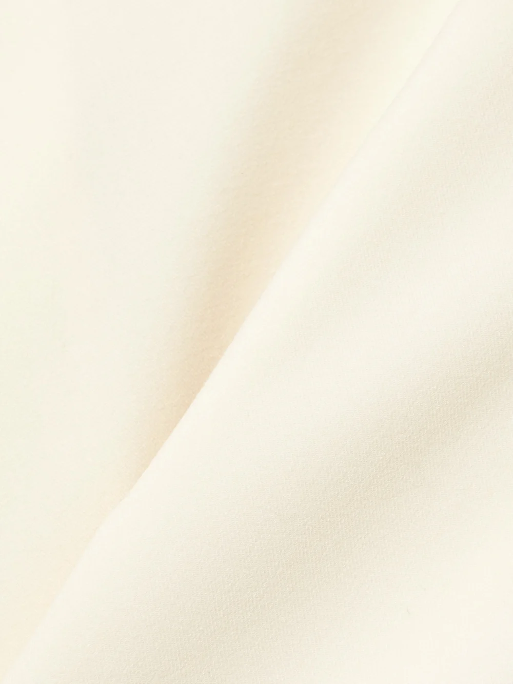 Close-up detail of the Fforme Tenley Wool-blend Top