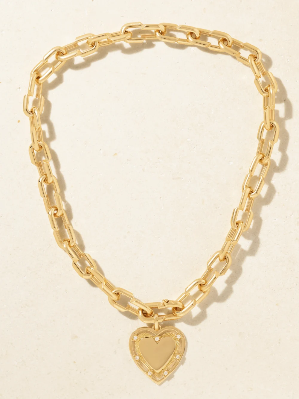 Close-up detail of the FoundRae Heart Token Love Medium 18-karat Gold Diamond Necklace