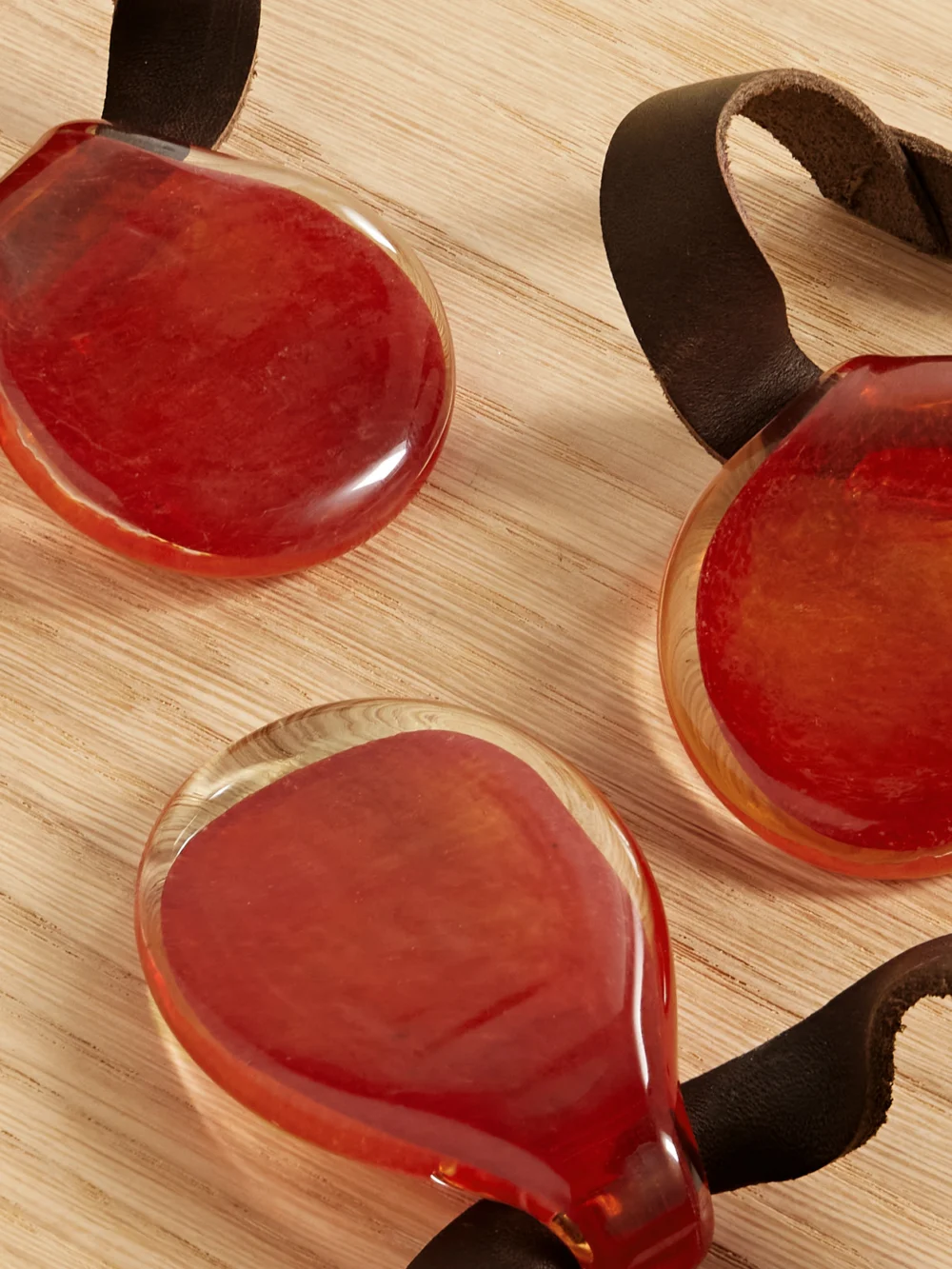 Close-up detail of the Fourth Street Set of Four Leather and Glass Napkin Rings
