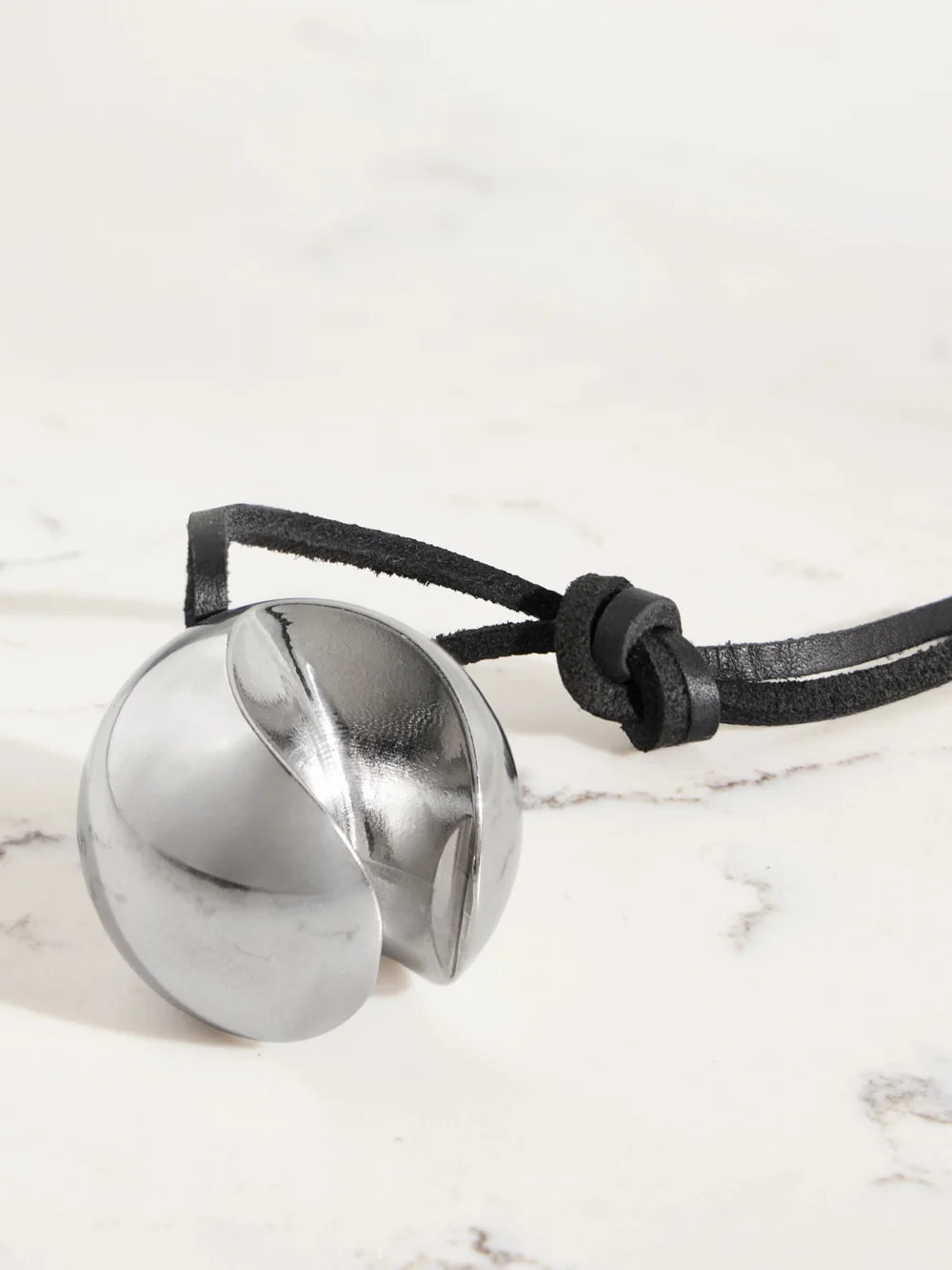 Close-up detail of the Fourth Street Silver-tone Bottle Opener
