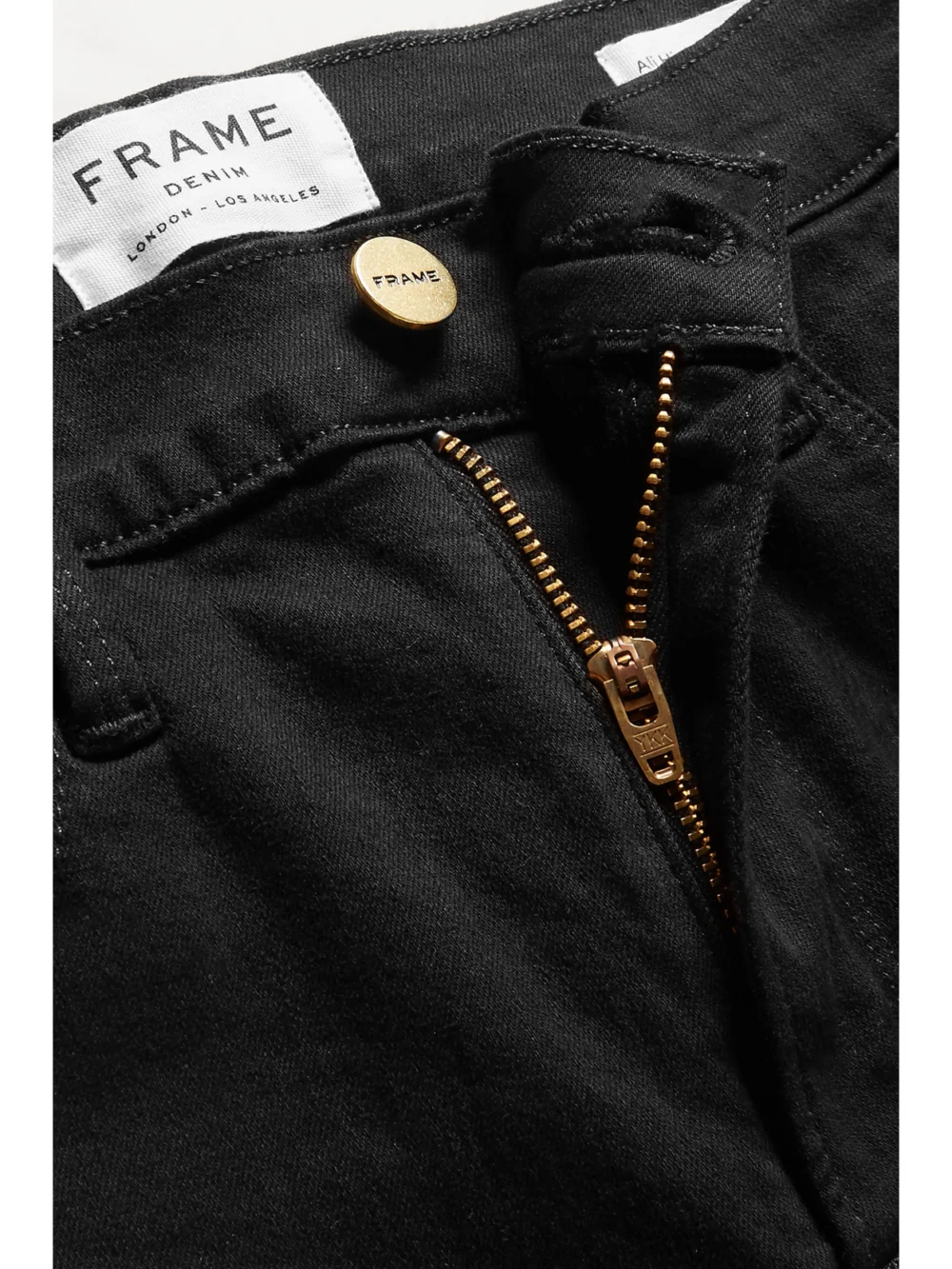 Close-up detail of the Frame Ali High Rise Cigarette Skinny Jeans
