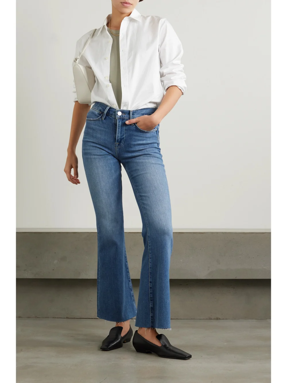 Frame Le Easy Flare Mid-rise Jeans, worn by a model