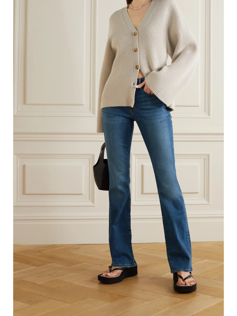 Frame Le Mini Boot Mid-rise Flared Jeans, worn by a model