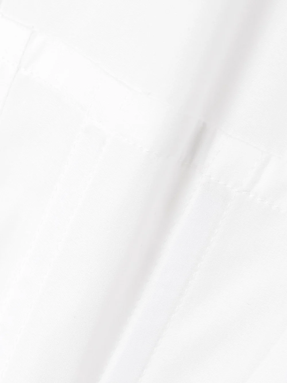Close-up detail of the Gabriela Hearst Eugene Pleated Cotton-poplin Maxi Shirt Dress