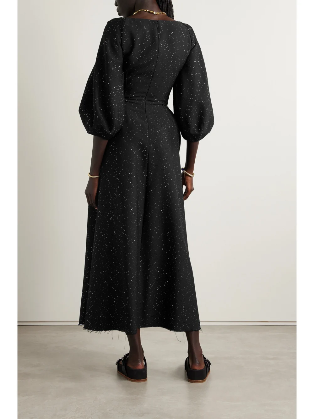Back view of the Gabriela Hearst Madyn Buckled Cutout Sequin-embellished Wool-blend Maxi Dress