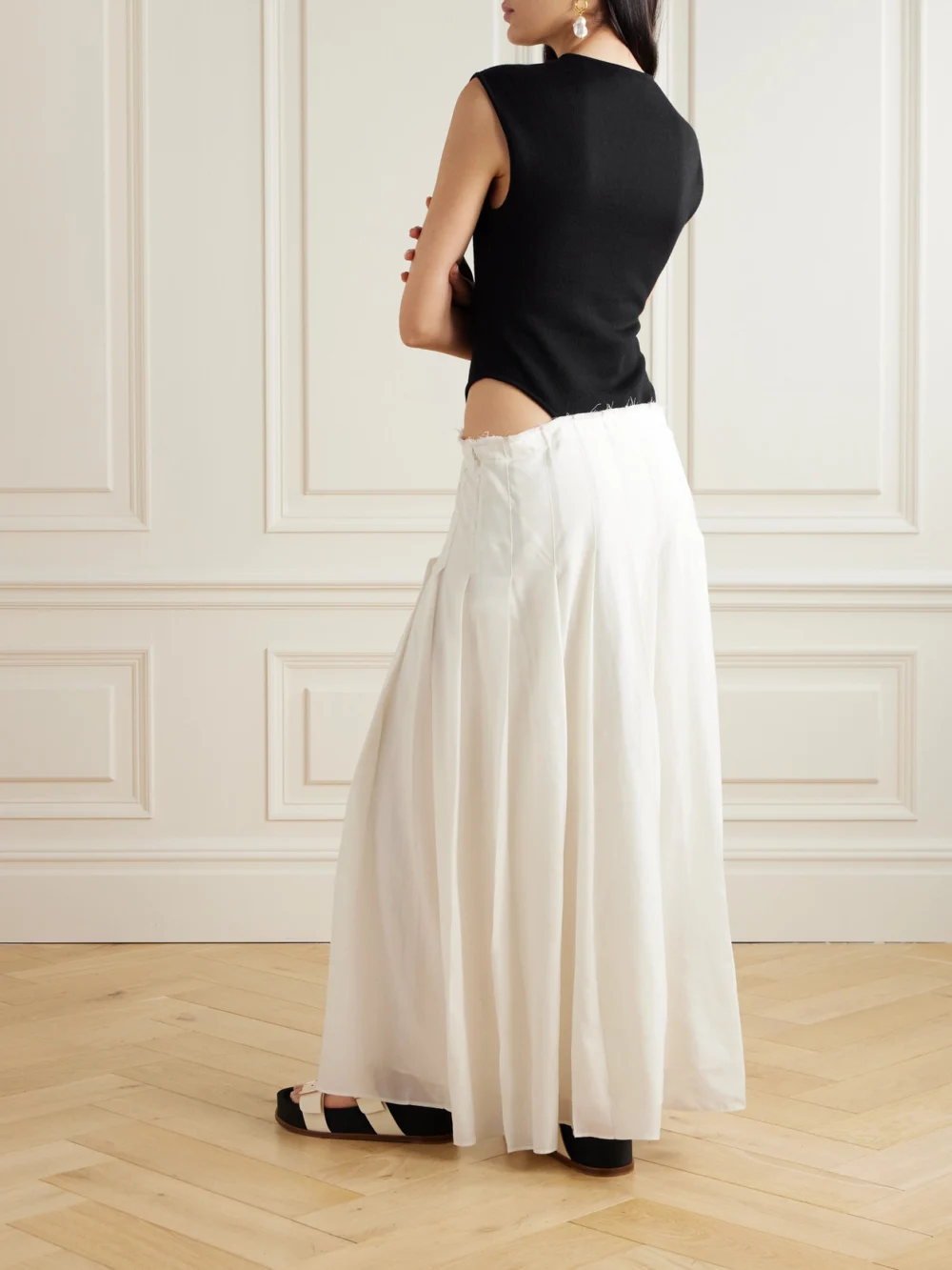 Back view of the Gabriela Hearst Mina Two-tone Cutout Wool and Cashmere-blend and Pleated Wool Maxi Dress