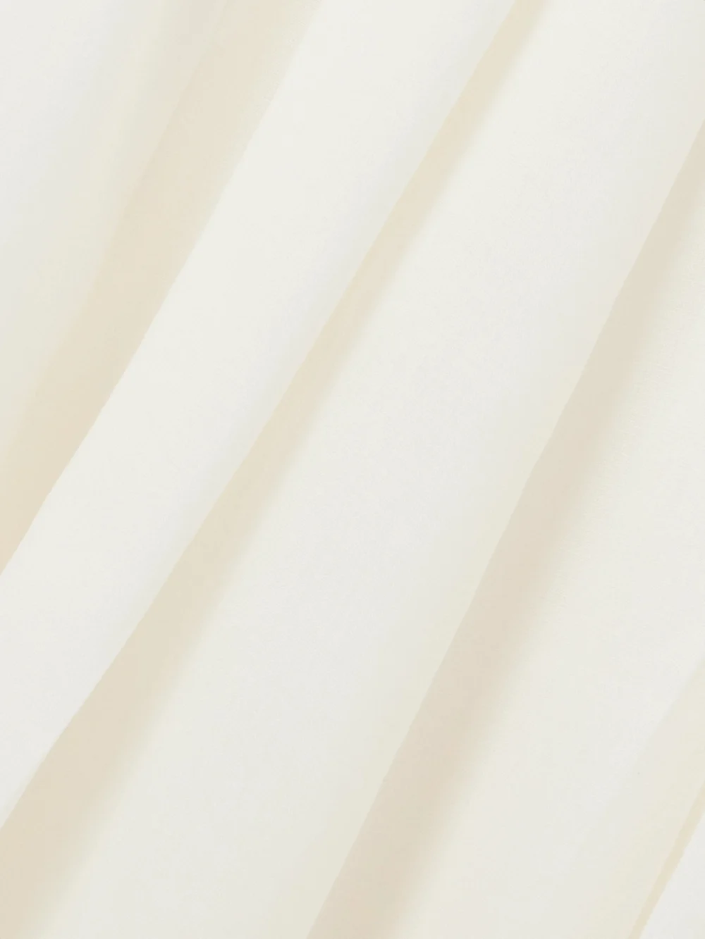 Close-up detail of the Gabriela Hearst Mina Two-tone Cutout Wool and Cashmere-blend and Pleated Wool Maxi Dress