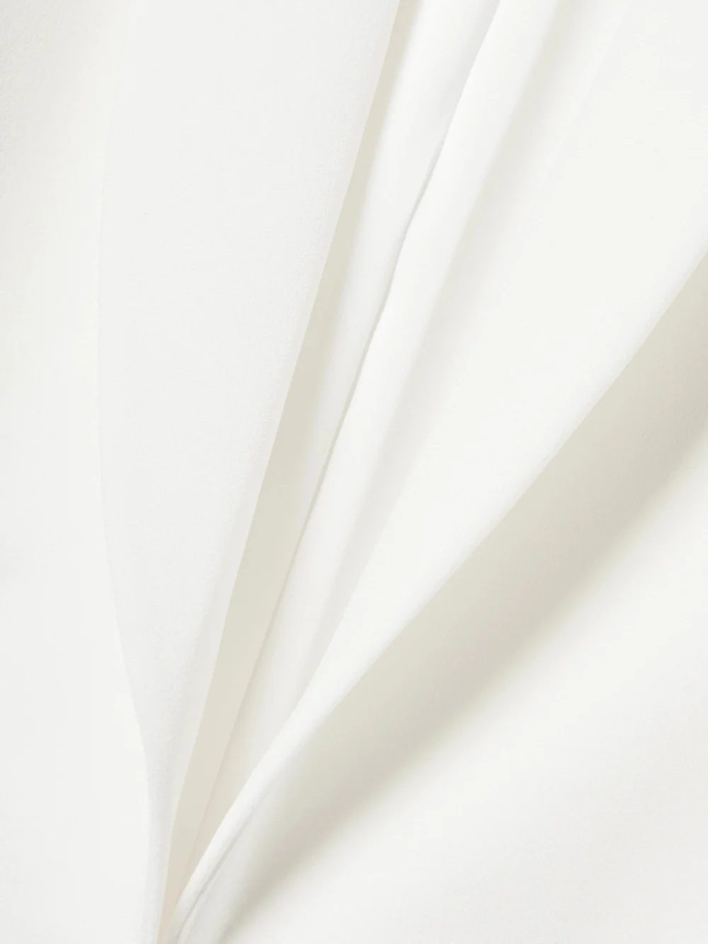Close-up detail of the Galvan Ellipse Cutout Satin-trimmed Crepe Blazer