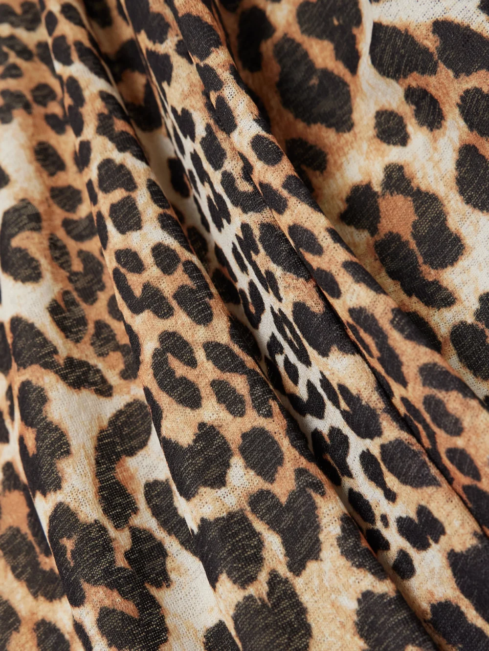 Close-up detail of the Ganni Asymmetric Draped Leopard-print Stretch Recycled-mesh Midi Dress