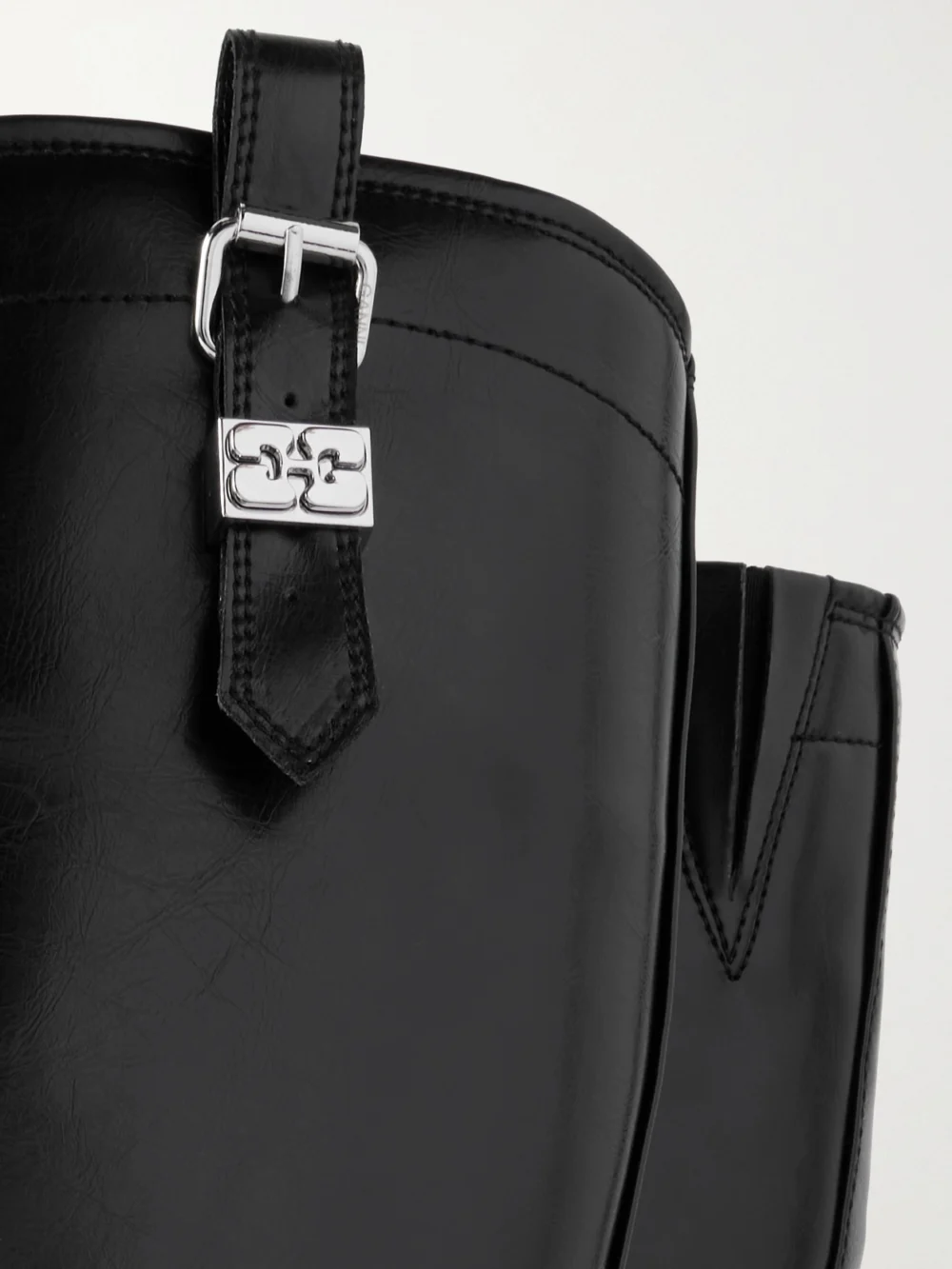 Close-up detail of the Ganni Embellished Oleatex™ Knee Boots