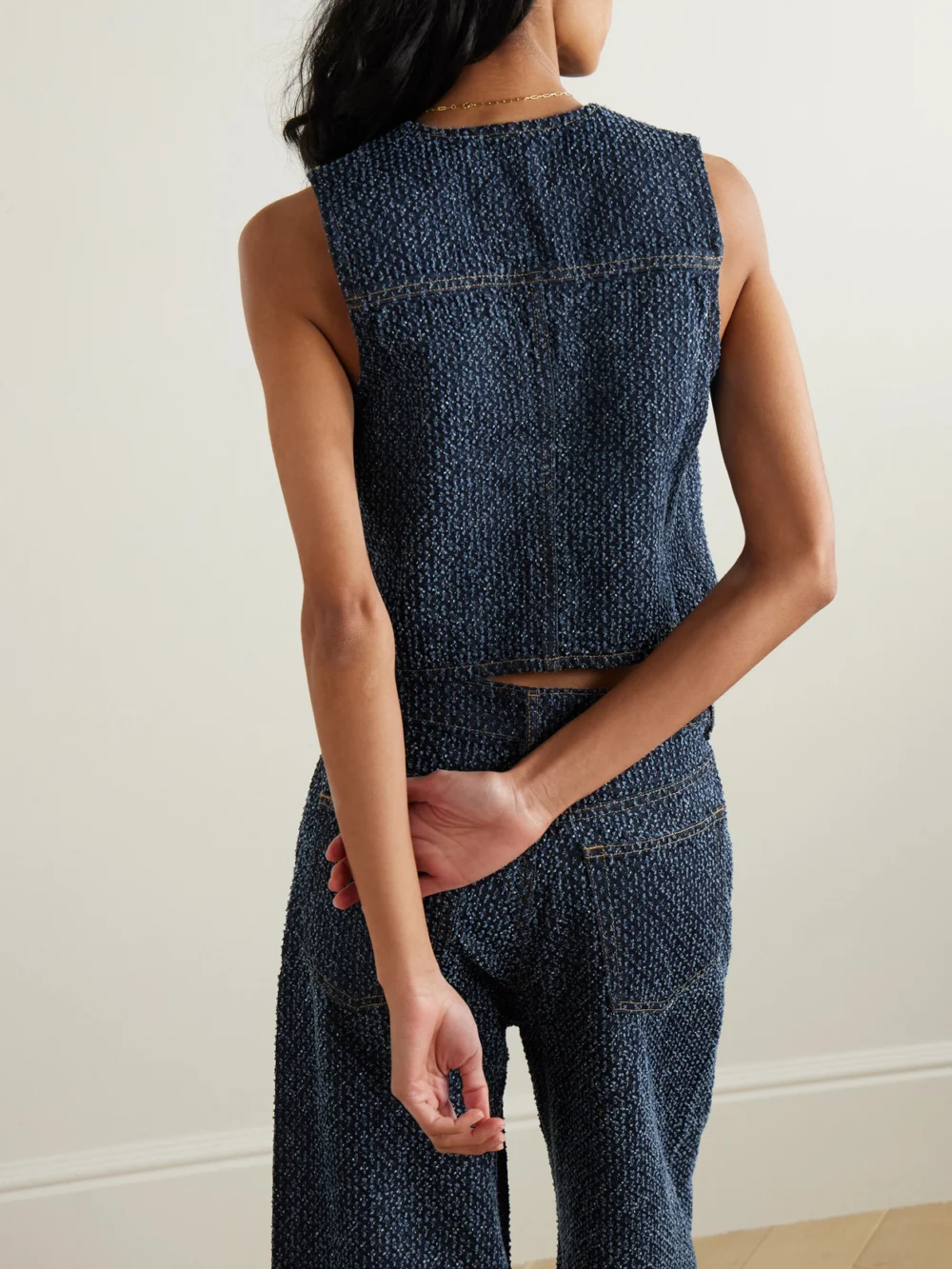 Back view of the Ganni Fluffy Distressed Organic Denim Vest