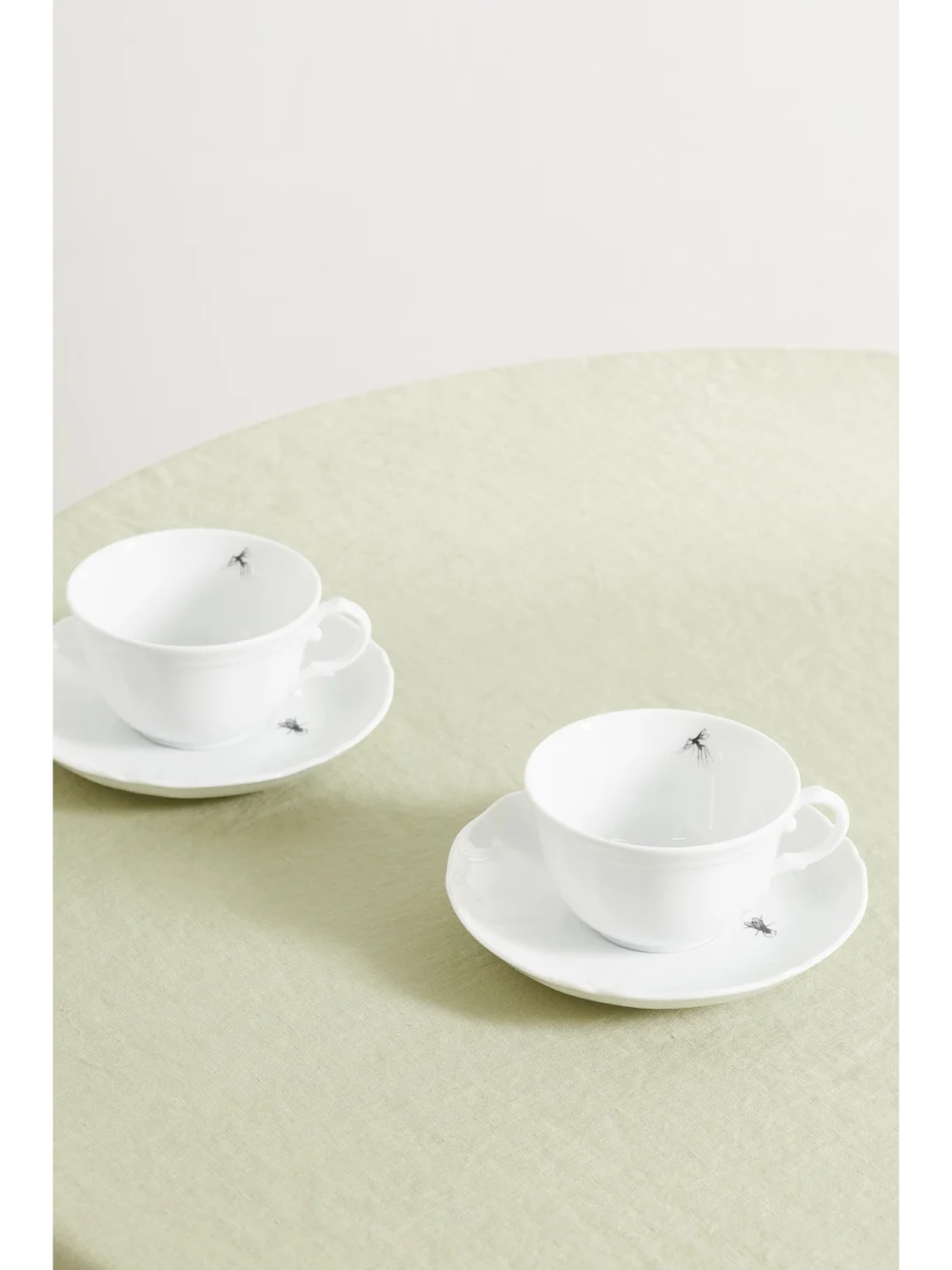 Back view of the Ginori + Off-white Printed Porcelain Tea Cup and Saucer Set