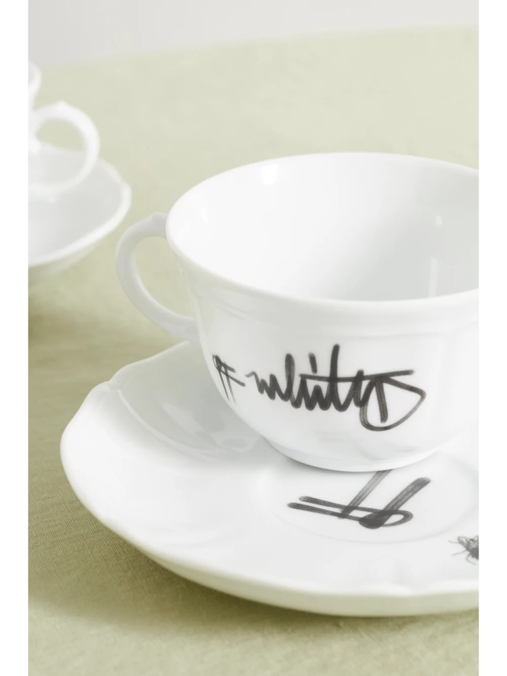Close-up detail of the Ginori + Off-white Printed Porcelain Tea Cup and Saucer Set
